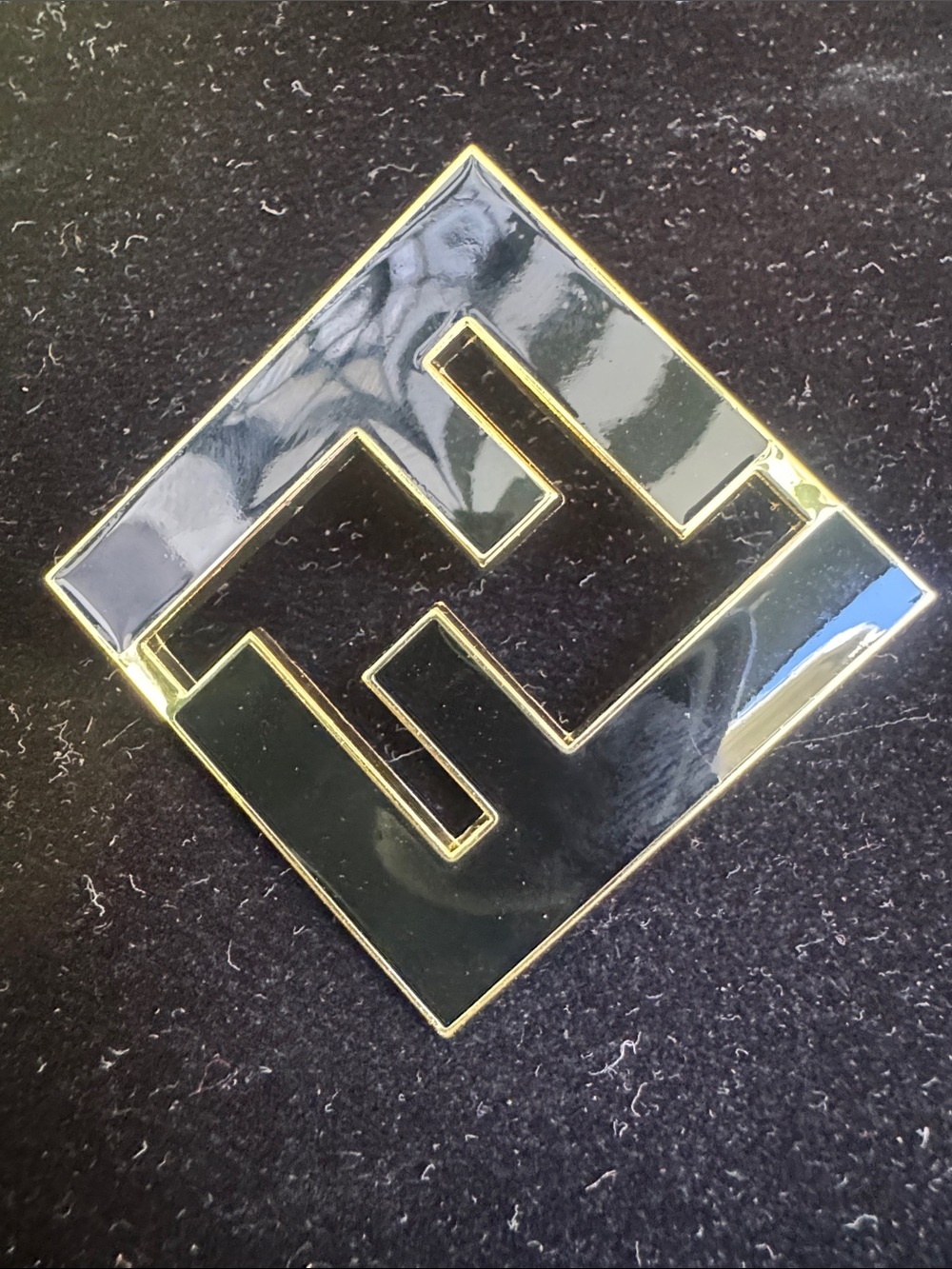 Brooch black enamel shiny gold tone trim